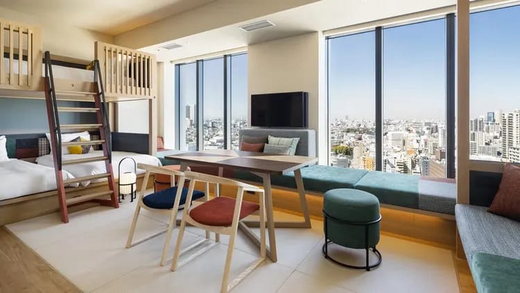 Modern OMO5 Tokyo Gotanda meeting room with breakout space for corporate retreats.