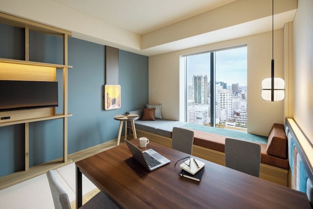 Meeting room with workspace at OMO5 Tokyo Gotanda, ideal for bleisure travel and remote work.