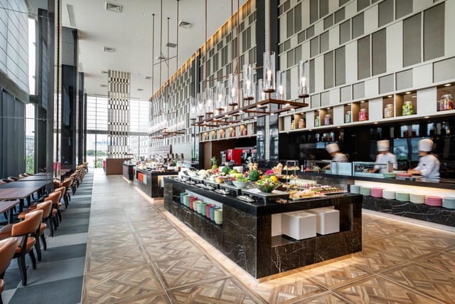 Modern hotel buffet restaurant for corporate breakfasts and networking events.