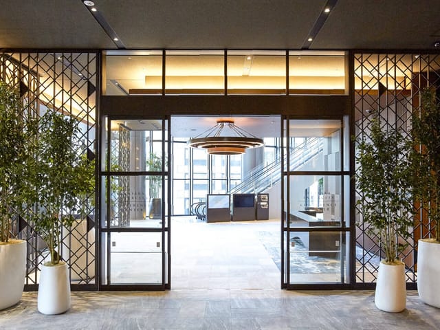 Modern Akasaka Intercity conference lounge and registration area for executive summits.