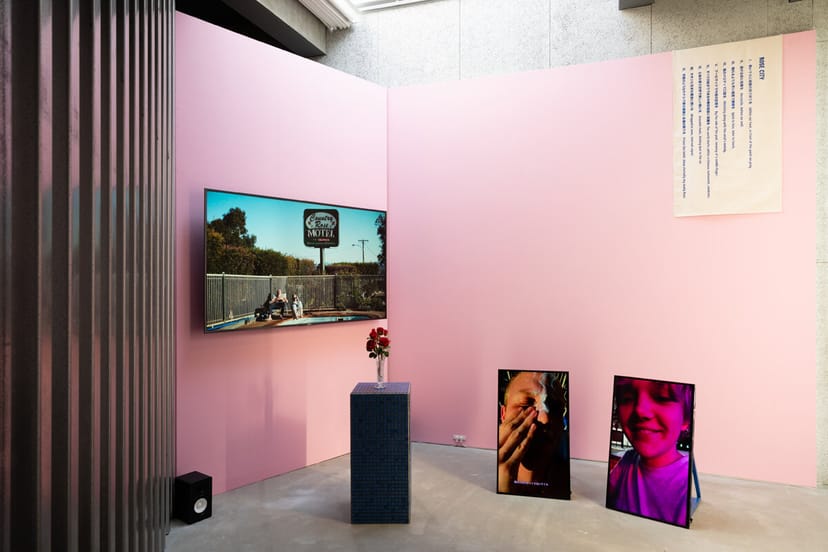 Shiseido Gallery exhibition with vertical walls, minimalist design, and event display.