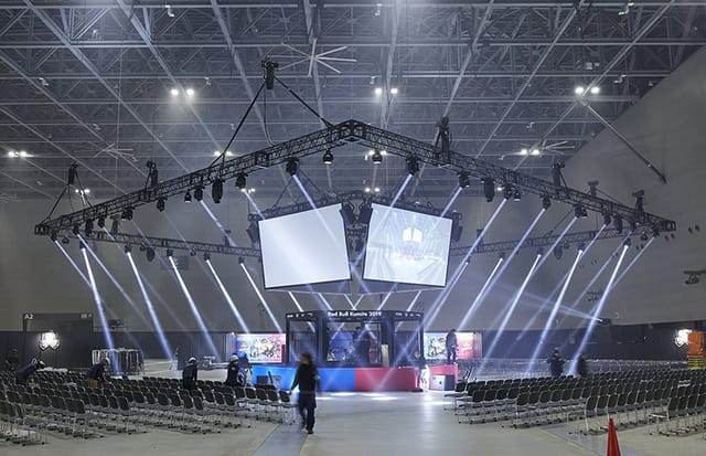 AV setup with dual screens at Tourism EXPO Japan conference hall.