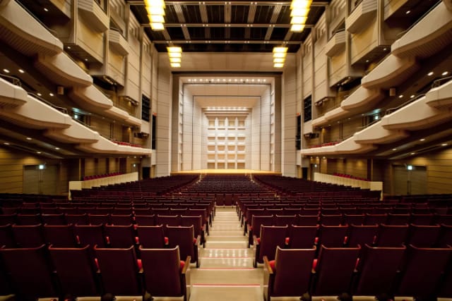 Bunkamura tiered auditorium with theater seating for large-scale keynotes and performances.