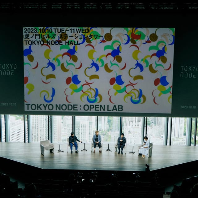 Modern Tokyo Node stage with panoramic city view, ideal for corporate events and tech conferences.