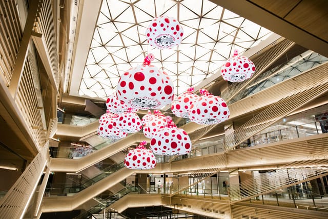The Grand Ginza atrium: dramatic multi-level event venue for brand activations and networking.