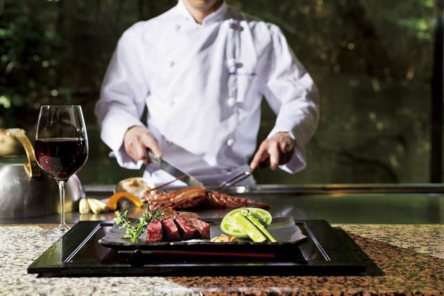 Steakhouse at Shinjuku Washington Hotel: live chef cooking for incentive dining events.