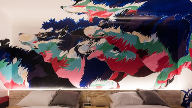 Thematic accent wall in BnA Hotel bar, trendy boutique hotel design and event space decor.
