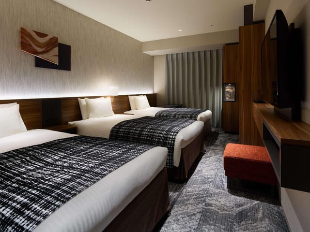 Triple-occupancy meeting room at Mitsui Garden Hotel Gotanda for corporate and student travel.