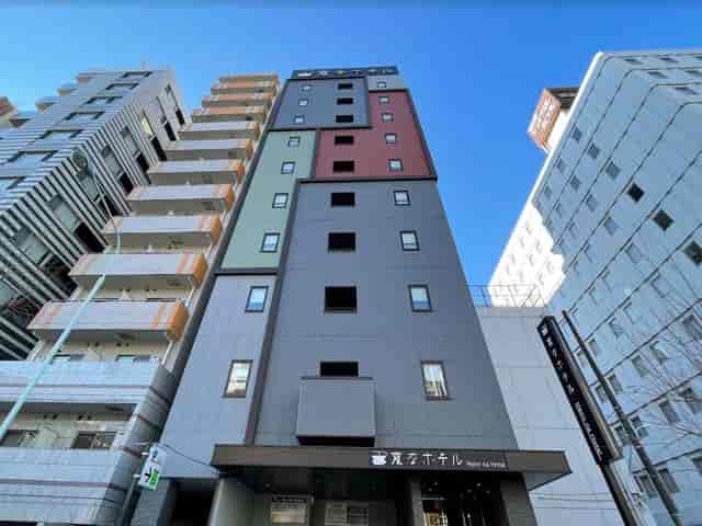 Modern lounge at Henn na Hotel Tokyo Ginza, perfect for business travel and solo event stays.