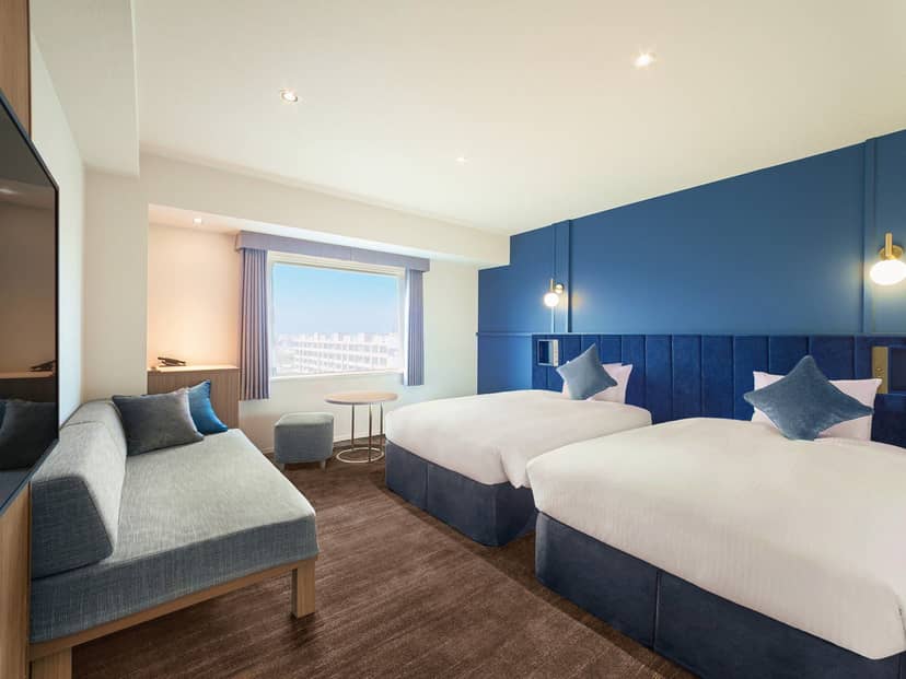 Modern Oriental Hotel Tokyo Bay banquet hall with functional lounge for business conferences.