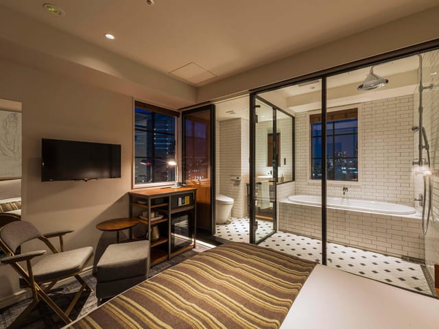 Modern Ebisu Holic Hotel lounge for upscale corporate business travel and lifestyle rest.