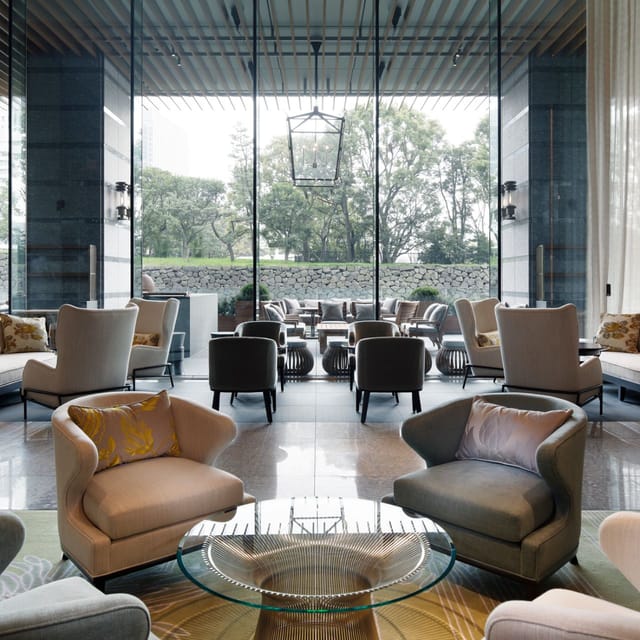 Tea house lounge with garden view for networking and premium corporate meetings.