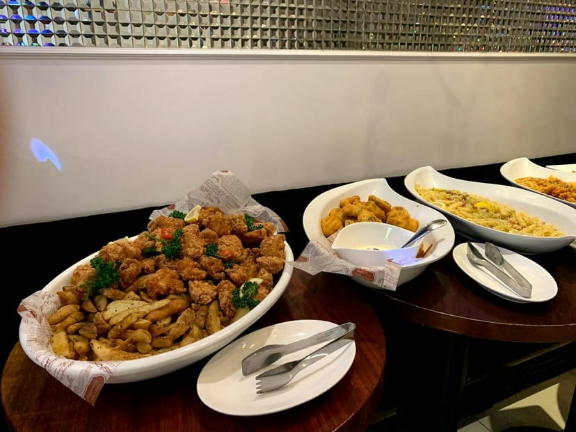 Chelsea Terrace casual buffet setup with comfort food for corporate catering and private events.
