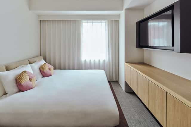 Modern meeting room at OMO3 Tokyo Akasaka with sleek minimalist decor for corporate events.