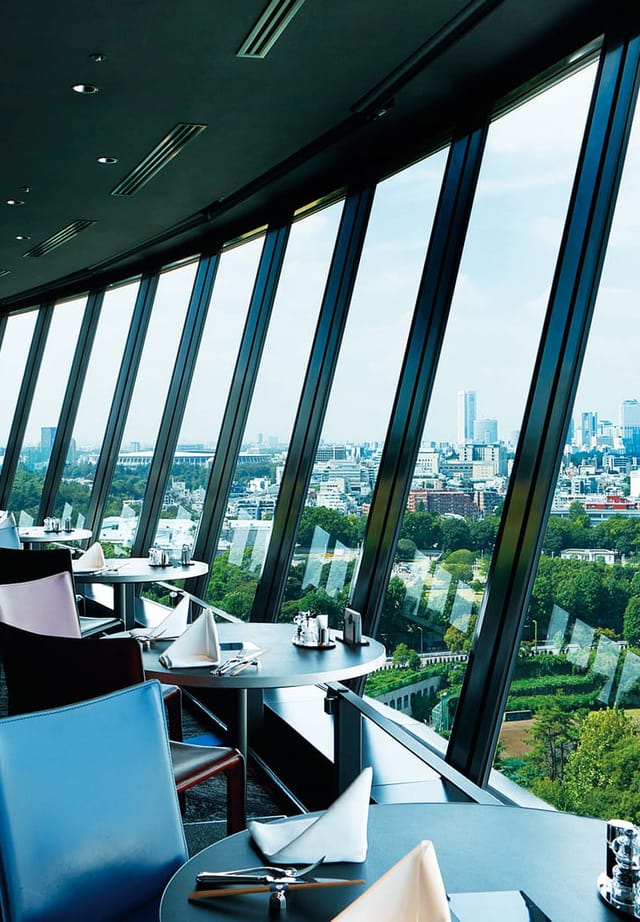 Executive dining at View & Dining The Sky with panoramic city views for exclusive networking events.