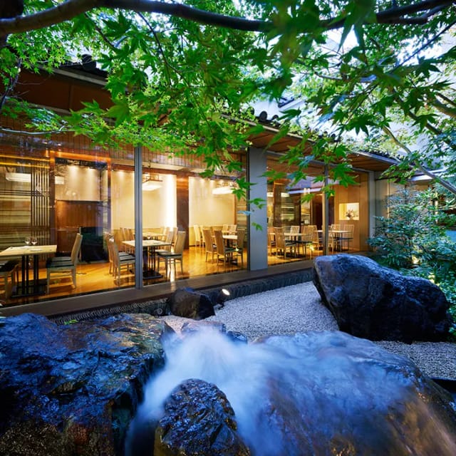 Zen garden view at Japanese Cuisine Yukuri, ideal for intimate corporate dinners or VIP events.