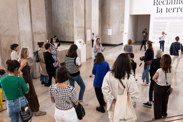 Guided museum tour at Tokyo Art Club event, featuring iconic architecture.