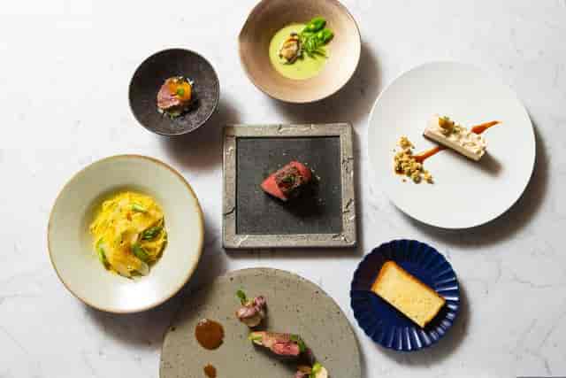 Tango terrace executive VIP dinner with exquisite plated tasting menu for corporate events.