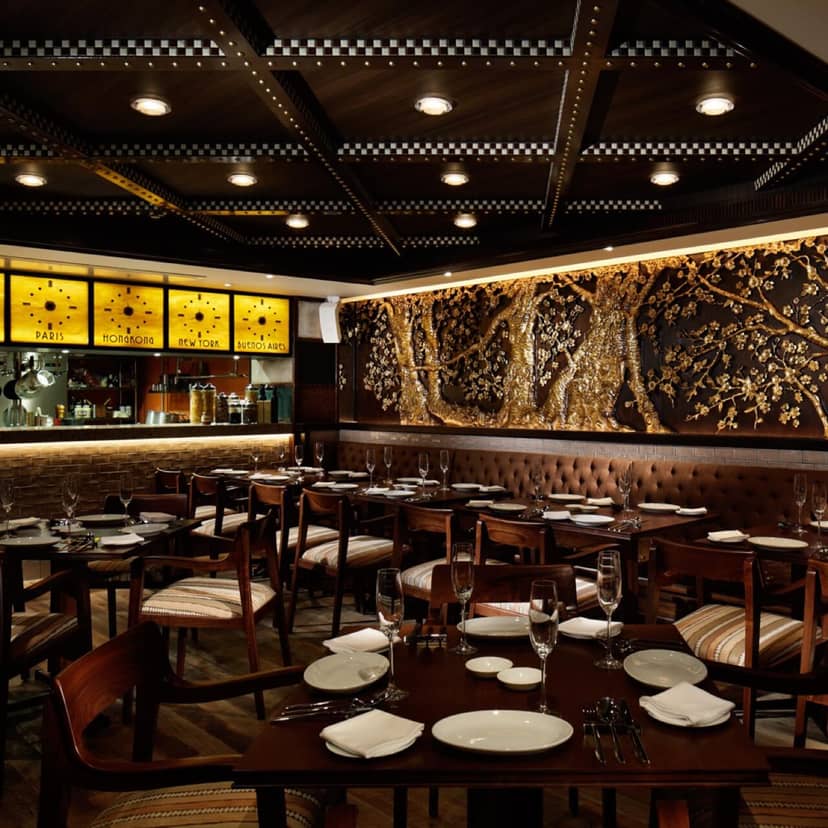 Upscale restaurant with mural for VIP corporate dining and professional networking events.