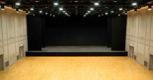 The Garden Room Yebisu: Versatile event space with professional stage for corporate presentations.