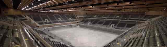 Tokyo Ariake Arena main hall with tiered seating for trade shows and sports events.