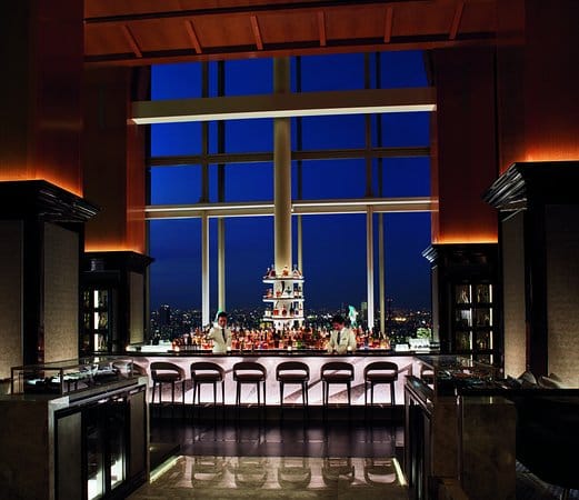 Lobby Bar with skyline view for upscale networking reception and executive cocktail hour.