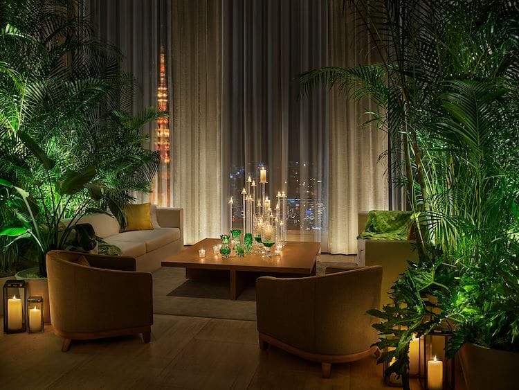Lobby Bar with dramatic vertical lighting for VIP reception and luxury corporate event venue.