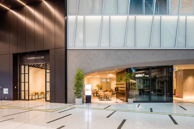 Modern Hills Café entrance at Roppongi Hills Arena, ideal for conference networking and events.