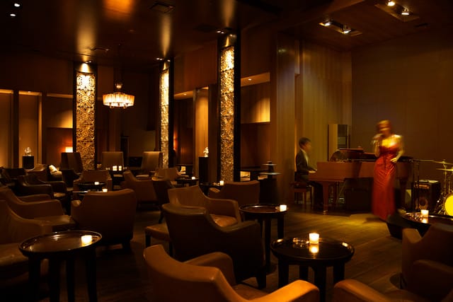 VIP networking lounge at The Bar, Roppongi with ambient lighting for high-end evening receptions.