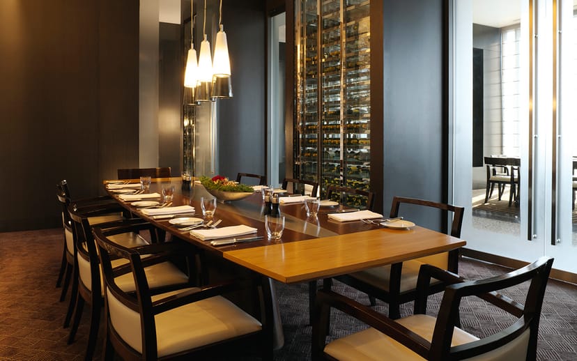 Sophisticated private dining room for executive meetings and VIP dinners.