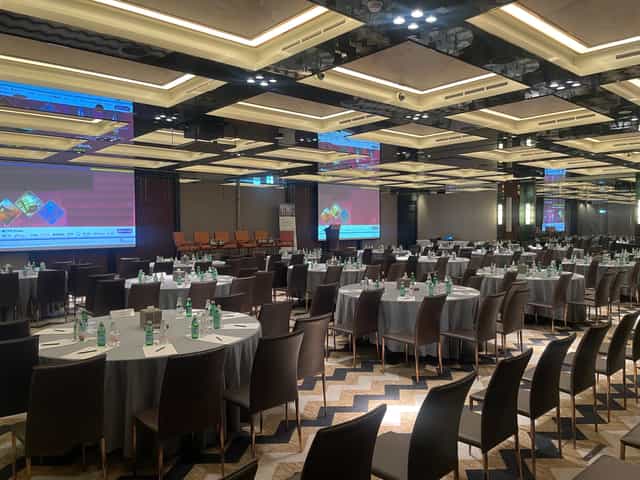 Waldorf Astoria DIFC ballroom with coffered ceilings for gala dinners and corporate conferences.