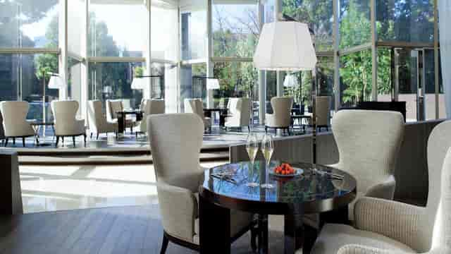 Sophisticated restaurant lounge foyer for VIP networking and corporate cocktail reception events.