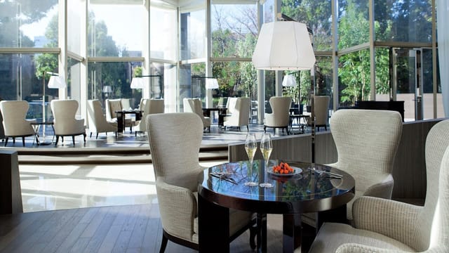 Sophisticated restaurant lounge foyer for VIP networking and corporate cocktail reception events.
