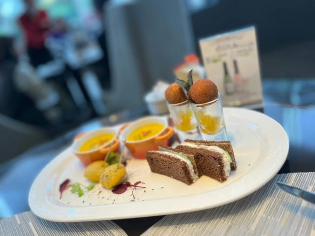 Gourmet plated meal at Lounge & Dining G, ideal for VIP lunch or networking reception.