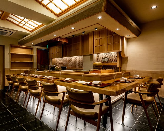 Private dining room with chef’s table setup for VIP events and networking.