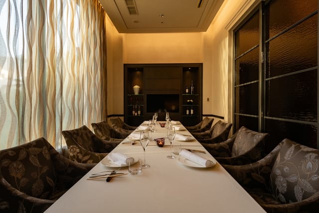 Private dining room at Keyakizaka, elegant boardroom setting for executive meetings and events.
