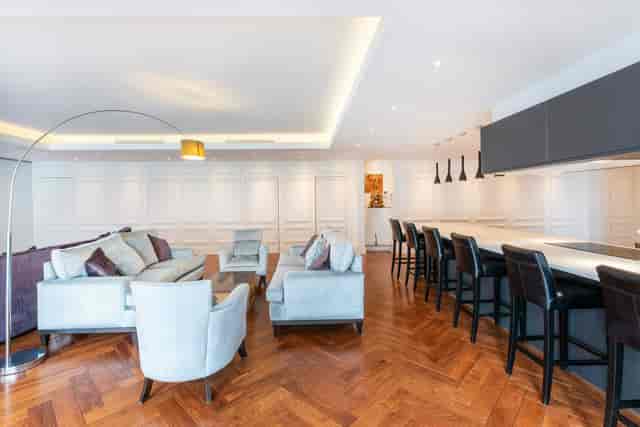 Lumiere London Apartment lounge for corporate networking and events with modern seating.