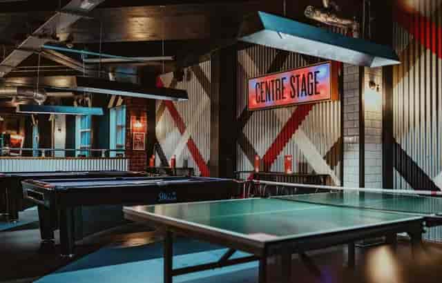 Centre Stage at Roxy Ball Room Liverpool - vibrant event space with game tables for gatherings.