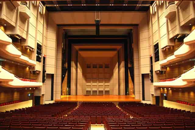 Orchard Hall proscenium theater with fixed seating for keynote addresses and award ceremonies.