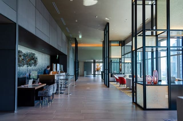 Contemporary luxury hotel lobby, The Blossom Hibiya, for VIP event registration or networking.