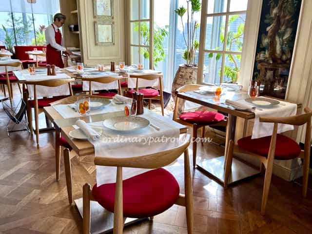 Private dining room at Esterre with elegant place settings for upscale corporate event hosting.