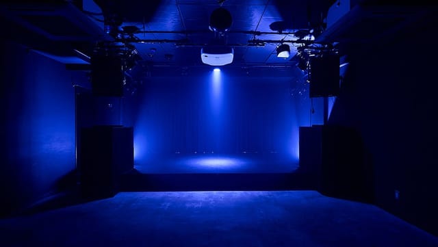 Black box club venue in KGRn Tokyo for intimate keynote events and theatrical productions.