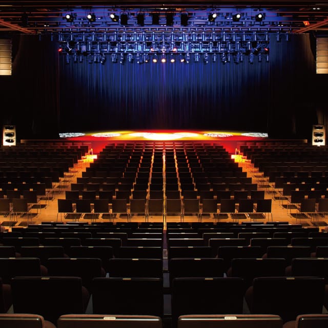 Nihonbashi Mitsui Hall theater stage with accent lighting for corporate keynote event venue.