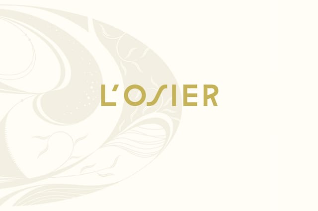 Minimalist L'OSIER restaurant interior for corporate gala and VIP hospitality.
