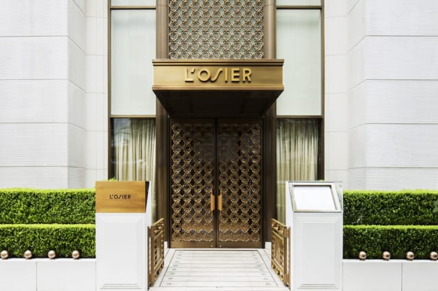 Private salon at L’OSIER, exclusive entrance for VIP dinners and executive meetings.
