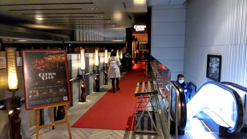 Red carpet entrance at Cotton Club for upscale event branding and wayfinding.