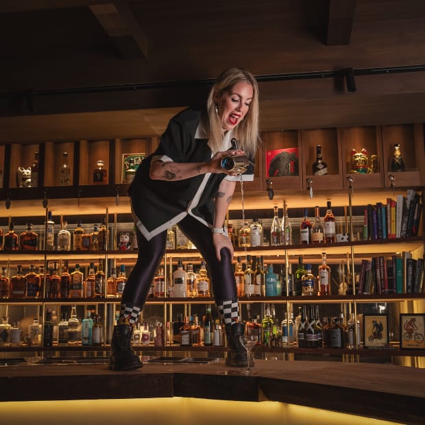 Bartender performing at Tokyo Confidential rooftop bar for corporate events and brand activations.