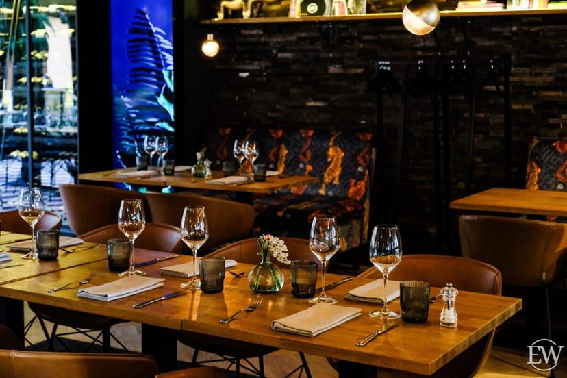 Upscale restaurant with mood lighting for sophisticated networking dinners and corporate events.