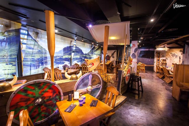 Themed Viking-style event space for immersive dining and corporate breakout sessions.