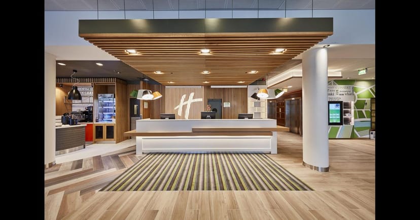 Modern Holiday Inn Helsinki conference lobby for efficient group check-in and event registration.